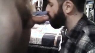 Sub sucking and feeding on his mans load