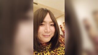 Chinese crossdresses dressed in leopard Morphsuit