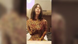 Chinese crossdresses dressed in leopard Morphsuit