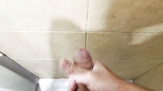 Milking off in the douche with powerful cum shot