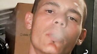 Handsome guy with necklace blow his smoke and spills his cum