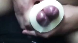 Buddies using a cock sleeve together with nice cumshots 12