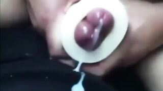 Buddies using a cock sleeve together with nice cumshots 12