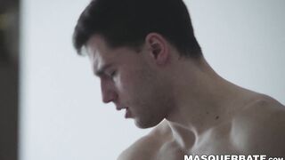 Handsome muscled jock Sam Cuthan jerks off his thick cock