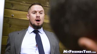 Suited gay businessman Skyy Knox worships his bosses feet