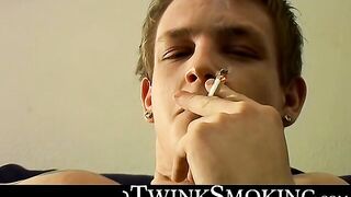 Bad stud Tomy chainsmoke his red cig while jerking on the couch