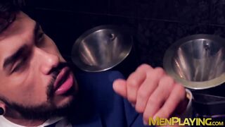 Two men in suits have sex in the toilet at work