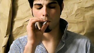 Hottie Ashley firing up his smoke before stroking his big dickÂ 