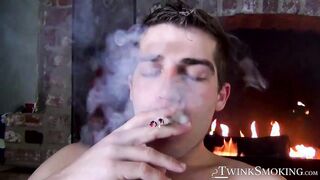 Sexy Austin smokes two at once before stroking his cock