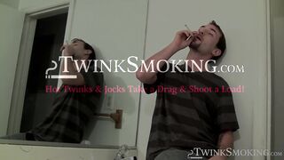 Attractive Paradox chainsmokin marlboro black while jerking his cock passionately