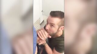 Handsome guy sucks dick in restroom stall74