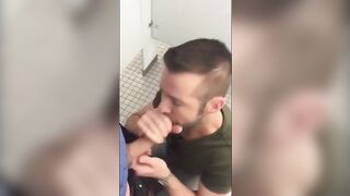 Handsome guy sucks dick in restroom stall74