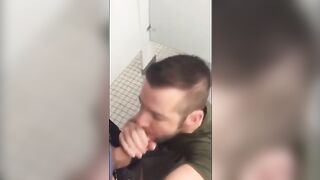 Handsome guy sucks dick in restroom stall74