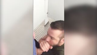 Handsome guy sucks dick in restroom stall74