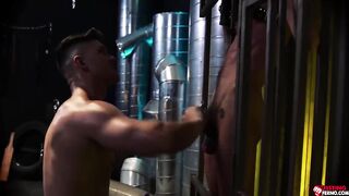 Liam Skye watches Tristan Hunter from a steel cage