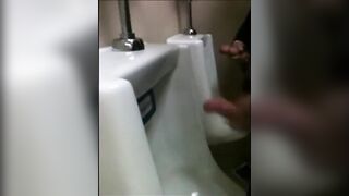 two slim dicks getting wanked at the urinals123