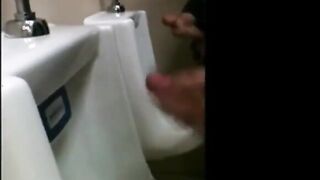 two slim dicks getting wanked at the urinals123