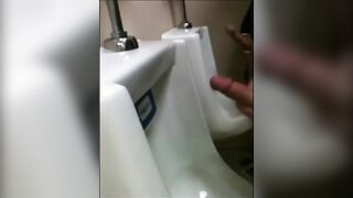 two slim dicks getting wanked at the urinals123