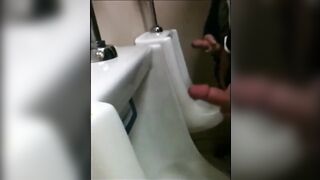 two slim dicks getting wanked at the urinals123