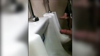 two slim dicks getting wanked at the urinals123