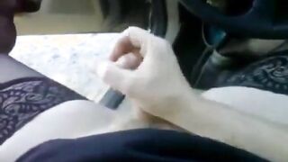 Bear in thigh high nylons jerking off in the car at the park