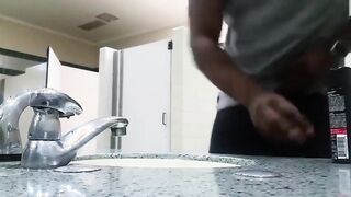 Black perv caught jerking in restroom