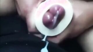 Buddies using a cock sleeve together with nice cumshots