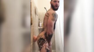 Tatted Hunk Fucks Dildo in Shower Until He Cums687