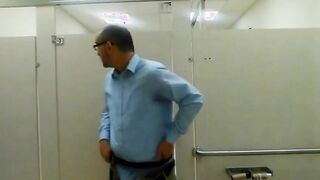 Tugging in a public rest room