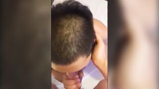 Asian dude inhaling