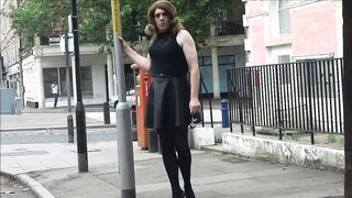 Wondrous Transvestite tugging out side the post office