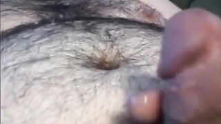 Hairy Man shooting a adorable geyser far