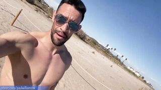 Gym trainer gets nude on a public beach in Spain