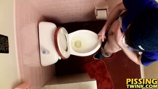 Devin Reynolds grabs his cock and unloads in the toilet