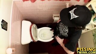 Devin Reynolds grabs his cock and unloads in the toilet