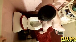 Devin Reynolds grabs his cock and unloads in the toilet