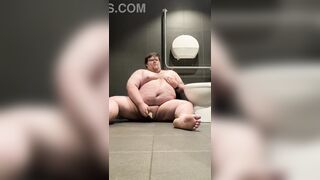 Obese plays in public douche