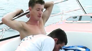 Naked horny twinks go sailing then fuck on a yacht