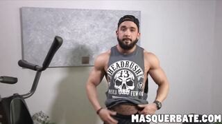 Muscular hunk with beard solo masturbating inside the gym