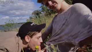 Summer joy of 2 young folks. Inhaling by the river