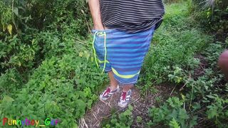 At the lake: Ambling and tugging off, with my swimming briefs down