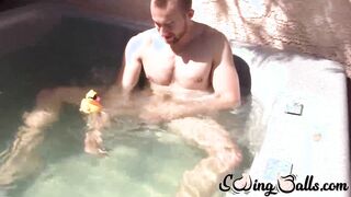 Cute jock masturbates in jacuzzi after fetish ball massage