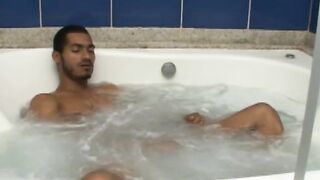 Gay Brazilian jerks off and dildoes his ass while bathing