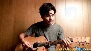 Handsome young man enjoys his guitar and jerkoff solo