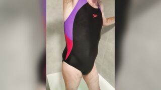 Crossdresser stroking off in a Speedo Bathing Suit