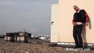 BullDogXXX.com - A Biker wanks off on the roof