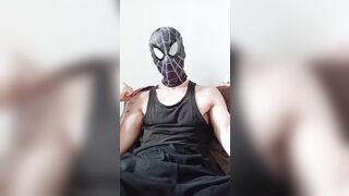 Spiderman wanks off and ejaculates in his cut-offs