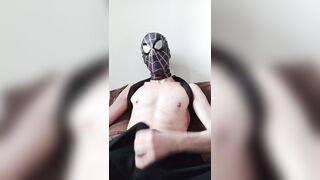 Spiderman wanks off and ejaculates in his cut-offs