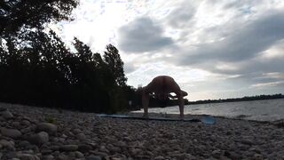 Slim naturist stud does yoga naked on a nudist beach. Nude yoga vid by Jon Arteen bummer pornography model