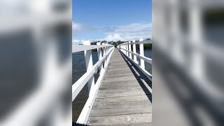 Bike railing and adventures in purple swimsuit